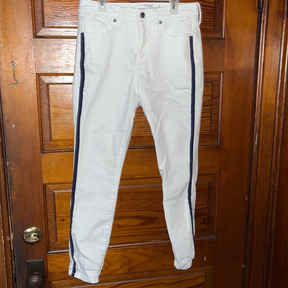 White jeans with blue stripe